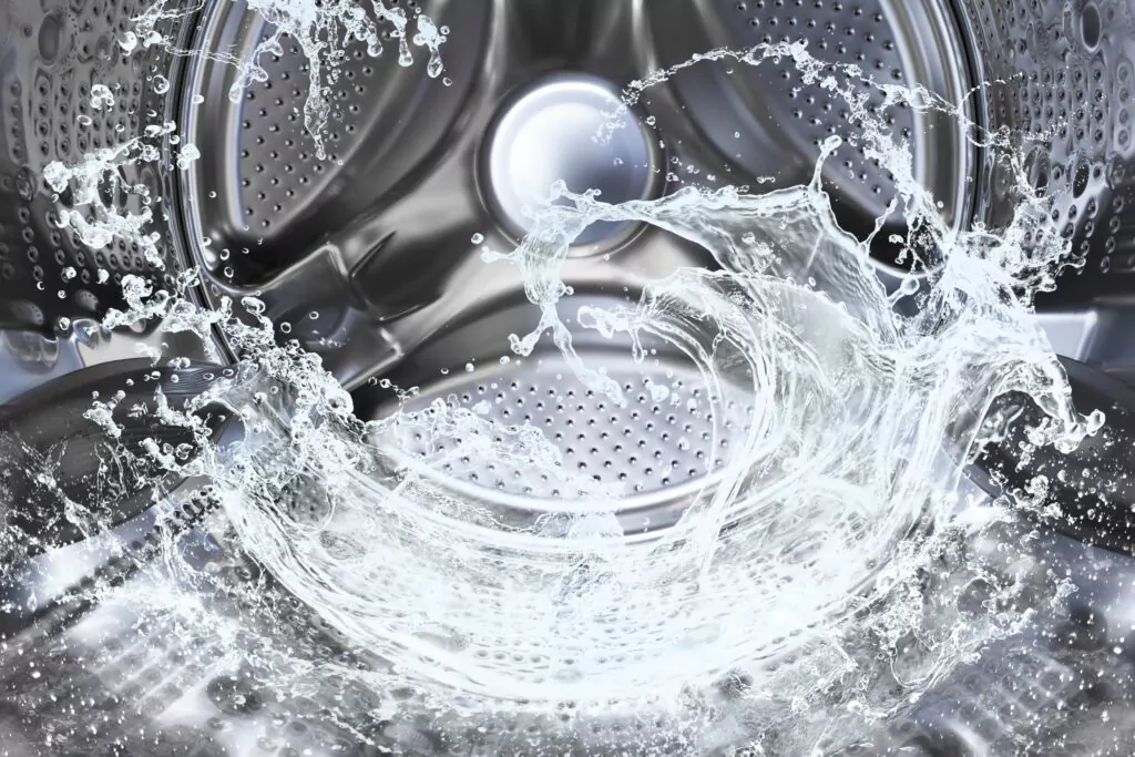 inside of a washing machine drum with water