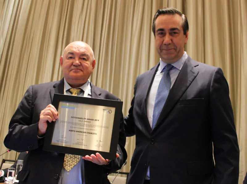 Cristobal Fuentes and Bernardo Velazquez accept the Gold Award for Sustainability.
